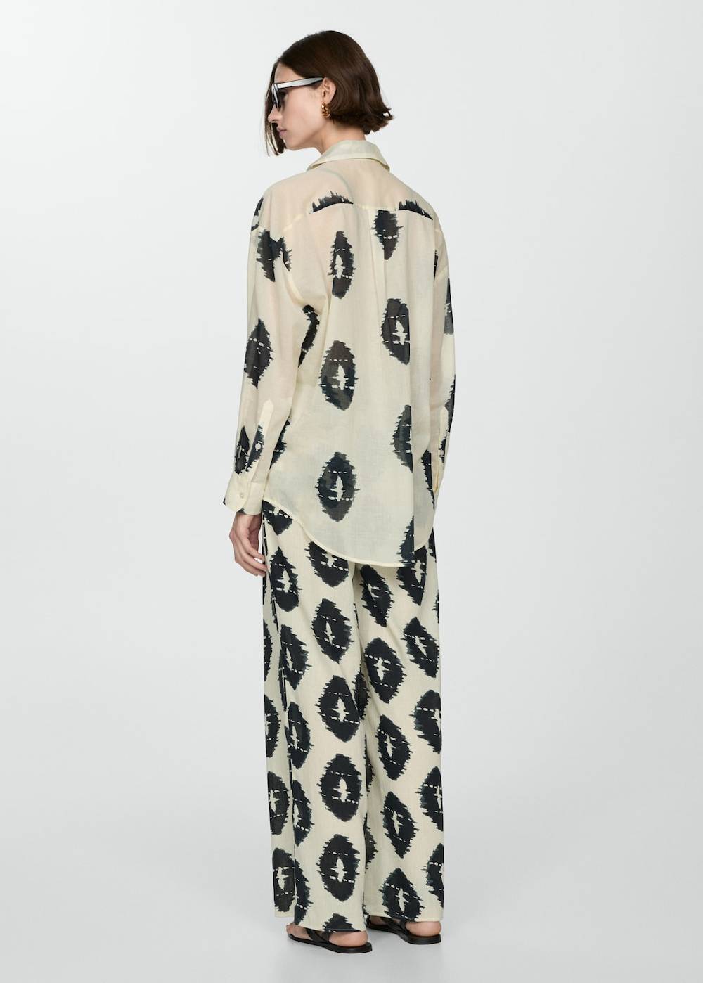 Mango Gemusterte Wideleg-Hose Rabatt