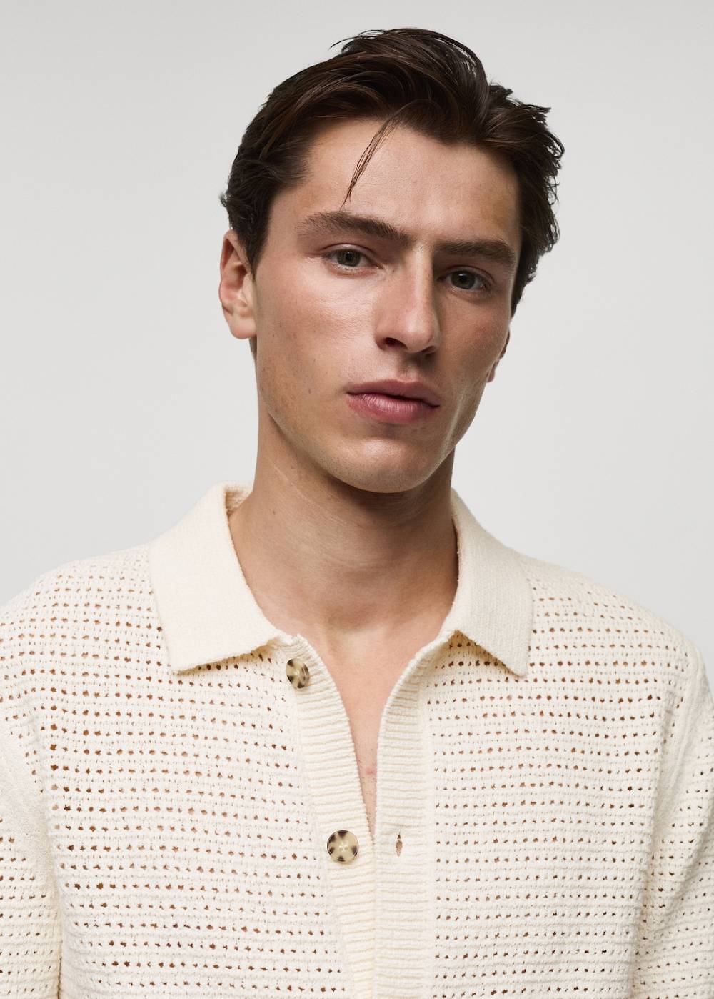 Mango Geknöpftes Strick-Poloshirt mit Lochmuster Fabrikladen