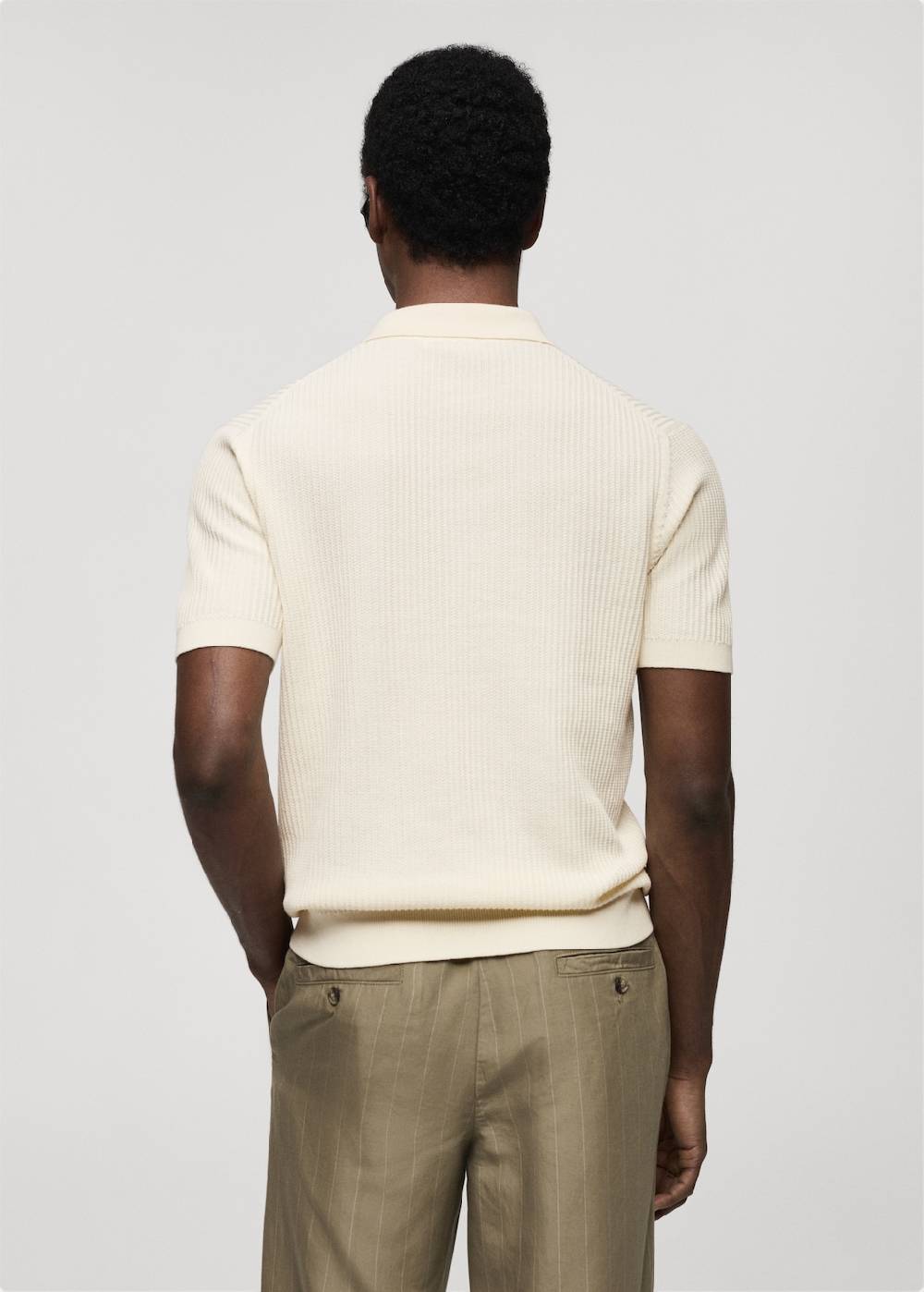 Mango Geripptes Strick-Poloshirt aus Baumwolle Speichern exportieren