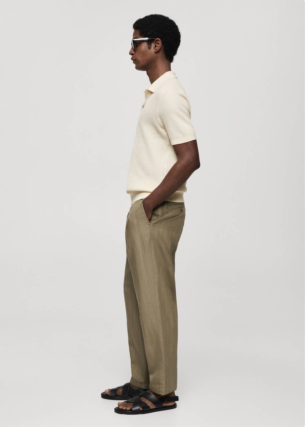 Mango Geripptes Strick-Poloshirt aus Baumwolle Speichern exportieren
